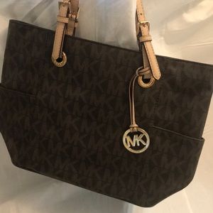 Michael Kors adjustable strap handbag.  Brown.